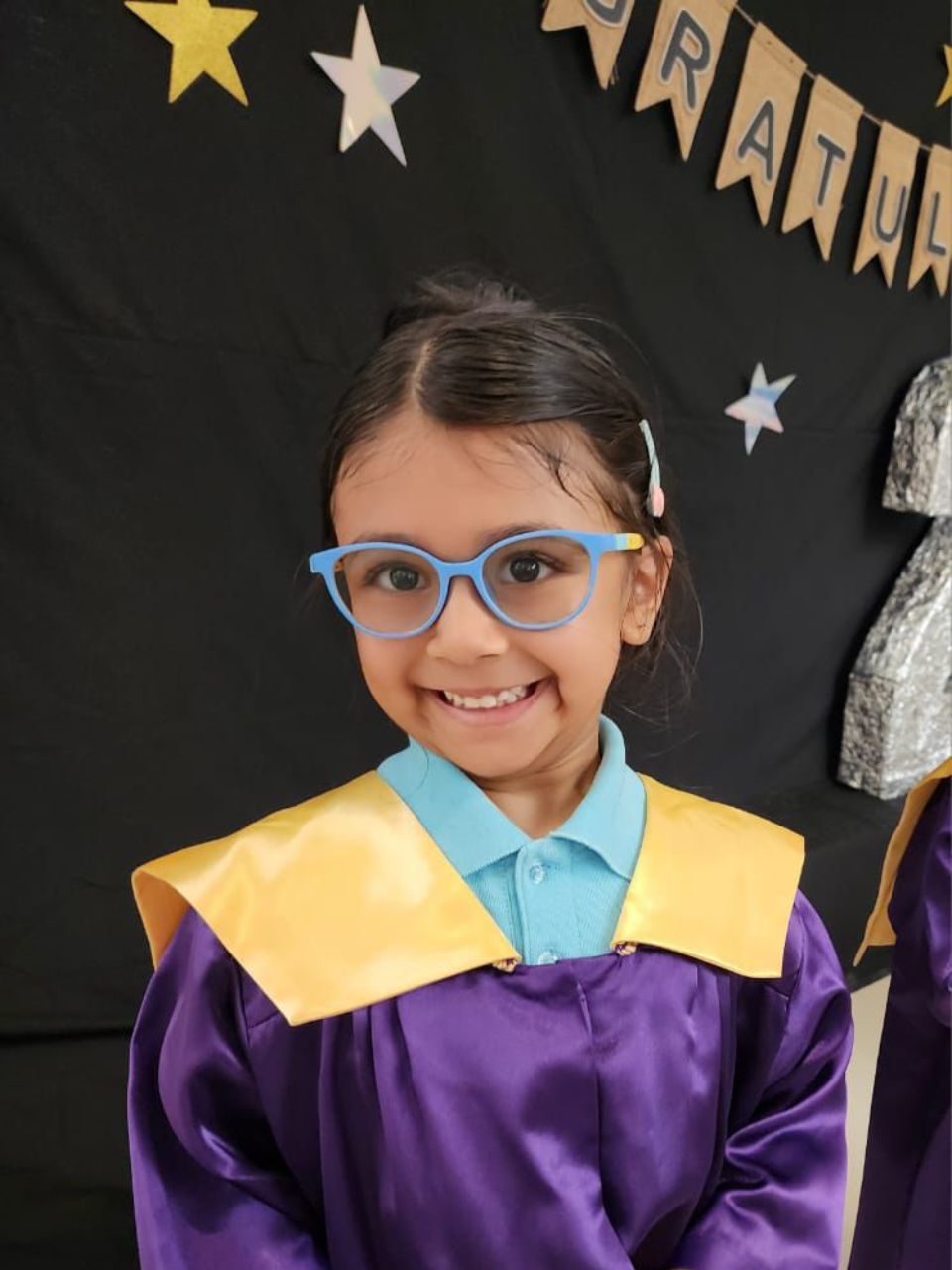 FS1 school graduation FS1 graduate smiling proudly at a British curriculum nursery in Dubai