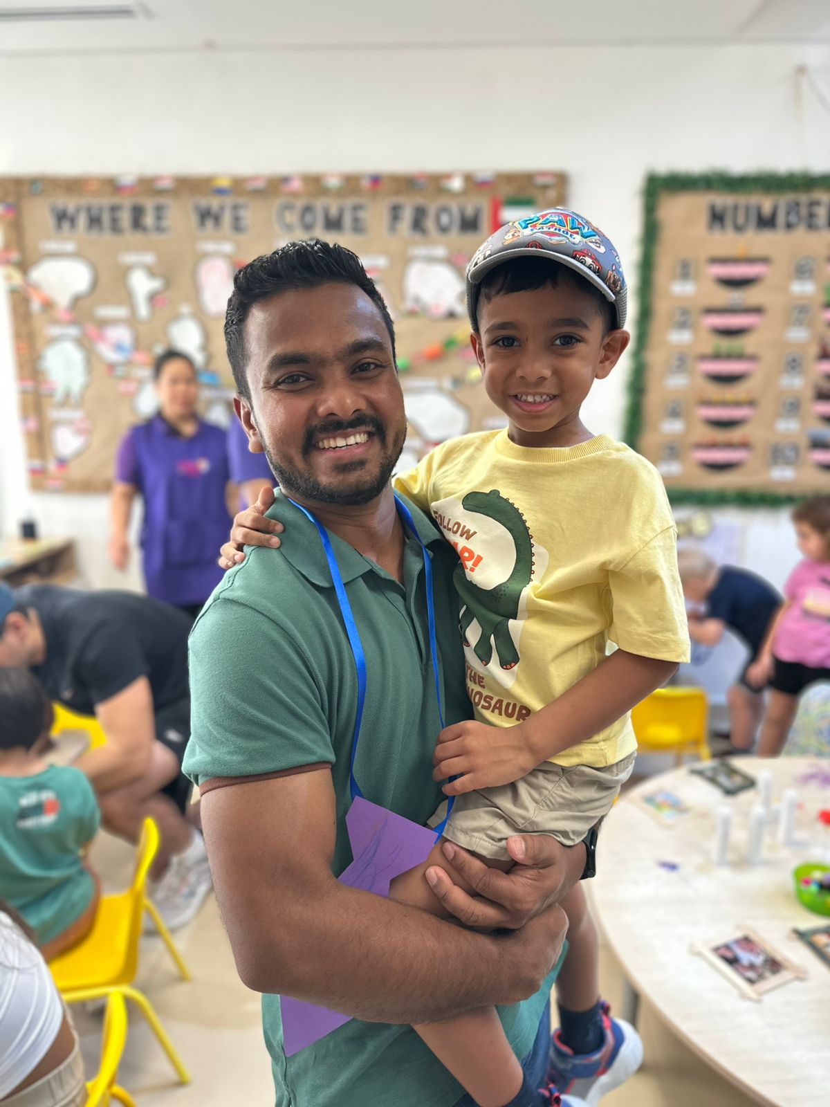 good nursery near me dubai Father and child smiling during Father’s Day celebration at a good nursery near me in Dubai Sports City