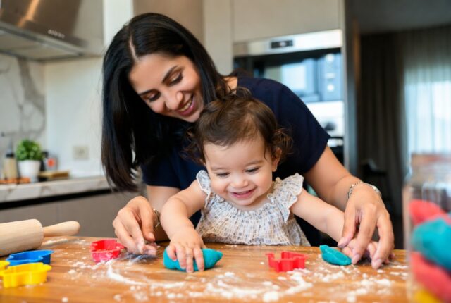 Dubai mother and toddler enjoying EYFS playdough activity at home